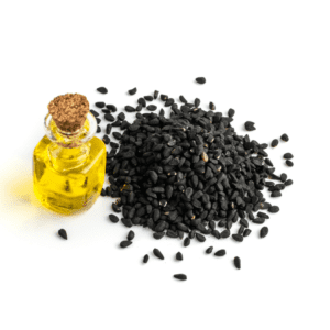 A bottle of oil and some black seeds